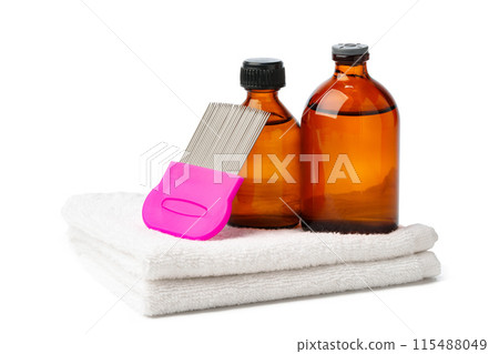 Comb, anti lice medicine and towel on white background Comb, anti lice medicine and towel on white background 115488049