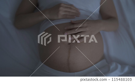 Depressed lonely Asian pregnant divorce woman in bedroom at home. Having a baby. Family people lifestyle. Mom. Depressed lonely Asian pregnant divorce woman in bedroom at home. Having a baby. Family people lifestyle. Mom. 115488103