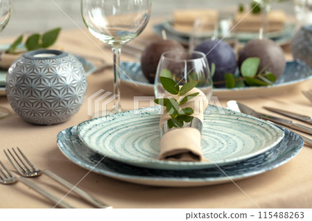 Table setting in restaurant with stylish decorations Table setting in restaurant with stylish decorations 115488263