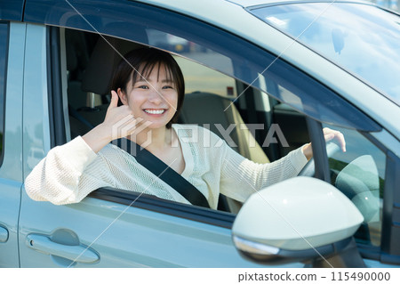Woman in a car, woman driving a car, woman driving 115490000