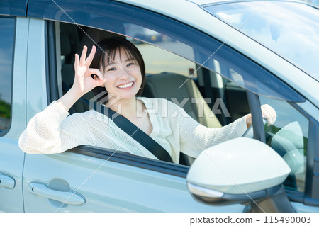 Woman in a car, woman driving a car, woman driving 115490003
