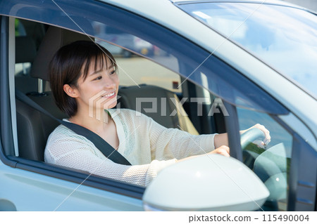 Woman in a car, woman driving a car, woman driving 115490004