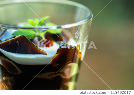 Coffee jelly poured into a glass Coffee jelly poured into a glass 115492017
