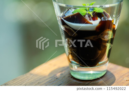 Coffee jelly poured into a glass Coffee jelly poured into a glass 115492022
