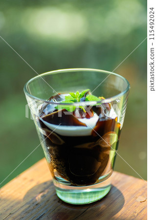 Coffee jelly poured into a glass 115492024