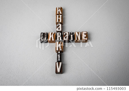 UKRAINE KHARKIV. Alphabet blocks, crossword puzzle on gray textured background 115493003