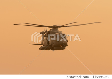 Royal Navy Merlin HM.1 anti-submarine patrol helicopter flying in the evening 115493069