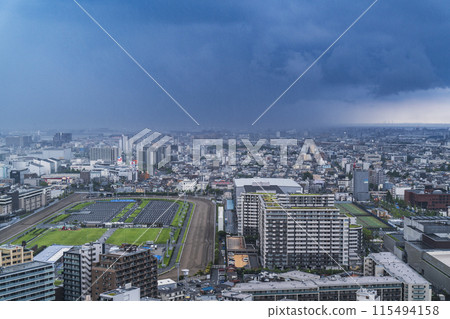 Rain clouds covering the city of Kawasaki, sudden downpours, localized heavy rain, bird's-eye view [Kawasaki City, Kanagawa Prefecture] 115494158