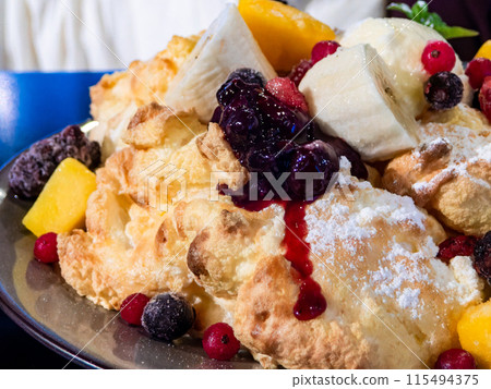 The most delicious sweets: fluffy pancakes The most delicious sweets: fluffy pancakes 115494375