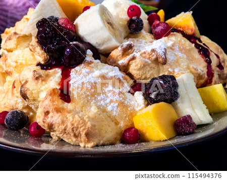 The most delicious sweets: fluffy pancakes The most delicious sweets: fluffy pancakes 115494376