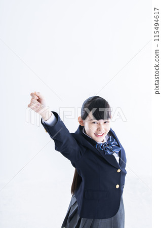 Female junior high school student, white background, portrait, fist pump 115494617