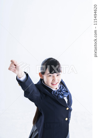 Female junior high school student, white background, portrait, fist pump Female junior high school student, white background, portrait, fist pump 115494620