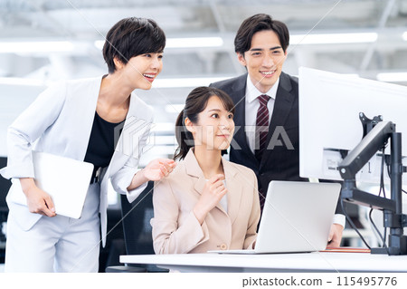 Male and female business people working in the office Male and female business people working in the office 115495776