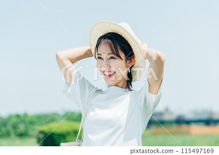 young woman in early summer 115497169