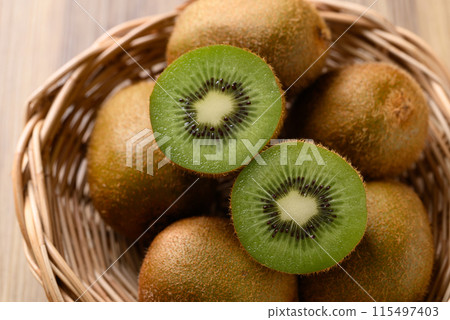 Fresh green kiwi fruit in basket, Healthy fruit Fresh green kiwi fruit in basket, Healthy fruit 115497403