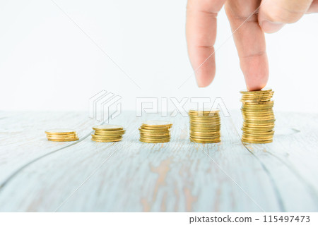 business and finance investment and saving activity with gold coin arrange on white isolated with finger acting background business and finance investment and saving activity with gold coin arrange on white isolated with finger acting background 115497473