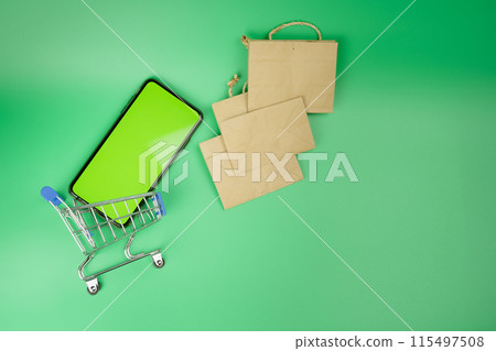 add to cart and shopping from home with flat lay shopping object and activity on green screen background add to cart and shopping from home with flat lay shopping object and activity on green screen background 115497508