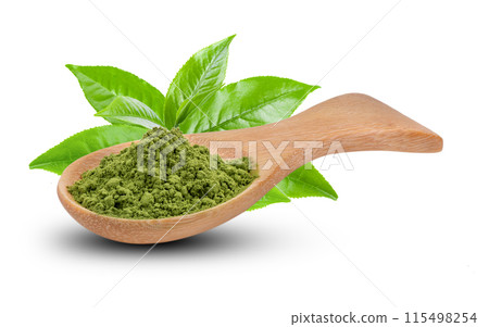 matcha green tea powder in wood spoon with leaves on white background matcha green tea powder in wood spoon with leaves on white background 115498254