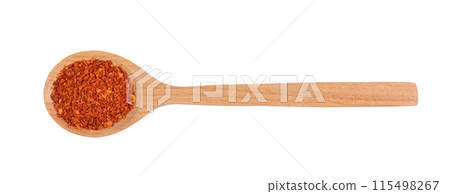 pile of red pepper in wood spoon on white background pile of red pepper in wood spoon on white background 115498267