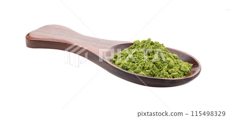 matcha green tea powder in wood spoon on white background matcha green tea powder in wood spoon on white background 115498329