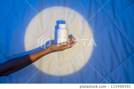 personal health and wellness through the symbolic representation of a supplement bottle 115499391