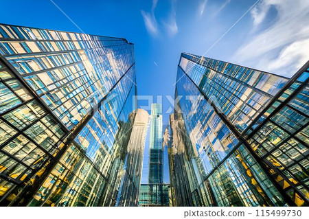 a very tall glass skyscraper a very tall glass skyscraper 115499730