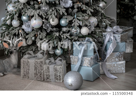 Presents and Gifts under Christmas Tree, Winter Holiday Concept Presents and Gifts under Christmas Tree, Winter Holiday Concept 115500348