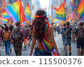 A woman wearing a rainbow headband 115500376