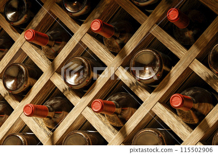 Bottles in a wine cellar 115502906