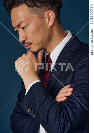 Thinking businessman 115503759