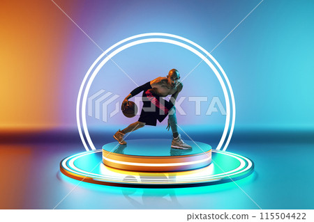 Focused man, basketball player in dynamic pose with ball on podium with led circle against colorful gradient background in neon. 3D render Focused man, basketball player in dynamic pose with ball on podium with led circle against colorful gradient background in neon. 3D render 115504422