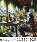 Man Working on Laptop on a Tropical Patio With Lush Greenery 115504925