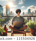 Young Man Working on Laptop on City Balcony in Afternoon Sunlight 115504926
