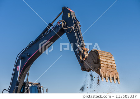 Close up details of industrial excavator working on construction site 4 115505337