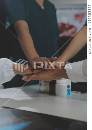Doctor handshake and partnership in healthcare, medicine or trust for collaboration, unity or support.Team of medical experts shaking hands in teamwork for or success in hospital 115505525