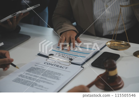 Judge gavel with Justice lawyers having team meeting at law firm background. Concepts of Law and Legal services. Judge gavel with Justice lawyers having team meeting at law firm background. Concepts of Law and Legal services. 115505546