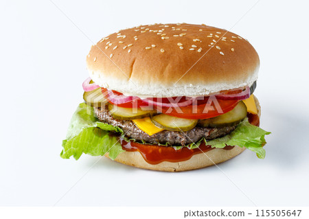Classic cheeseburger with beef patty, pickles, cheese, tomato, onion, lettuce and ketchup mustard isolated on white background. Classic cheeseburger with beef patty, pickles, cheese, tomato, onion, lettuce and ketchup mustard isolated on white background. 115505647