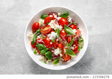 Salad of tomato, ricotta cheese and basil, top view Salad of tomato, ricotta cheese and basil, top view 115506278