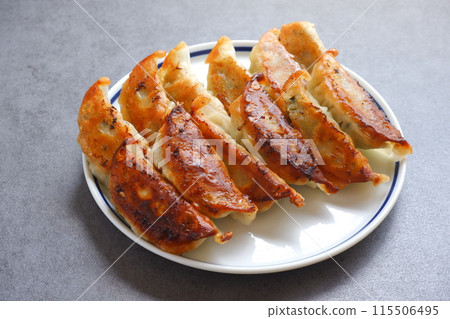 Grilled gyoza that is crispy on the outside and juicy on the inside. Grilled gyoza that is crispy on the outside and juicy on the inside. 115506495