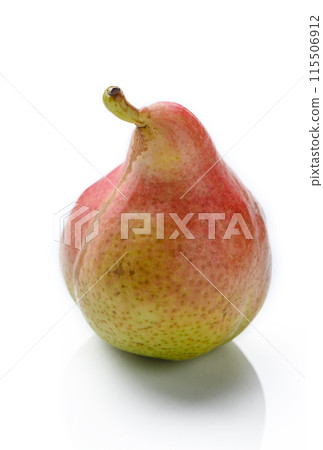 An upright ripe juicy golden and red pear isolated against a flat background. An upright ripe juicy golden and red pear isolated against a flat background. 115506912