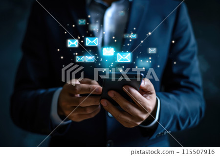 Businessman holding a phone with a message icons. Online communication and internet concept. Correspondence on social networks. Modern technologies. Businessman holding a phone with a message icons. Online communication and internet concept. Correspondence on social networks. Modern technologies. 115507916