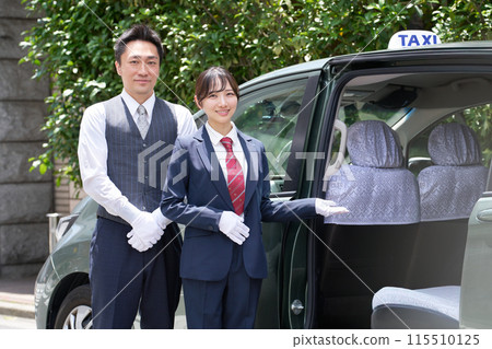 Male and female taxi drivers welcoming customers with a smile Male and female taxi drivers welcoming customers with a smile 115510125