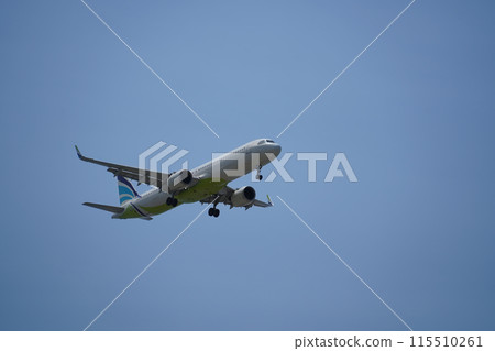 Airplane is flying in the sky with the landing gear down Airplane is flying in the sky with the landing gear down 115510261