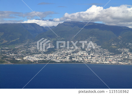 Aerial view of the city of Saint-Denis, the capital of the French overseas department of Reunion Island, over the Indian Ocean 115510362