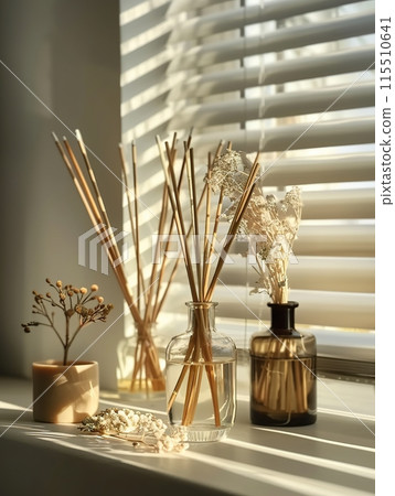 Sunlit Diffuser and Dry Flowers on Windowsill Sunlit Diffuser and Dry Flowers on Windowsill 115510641