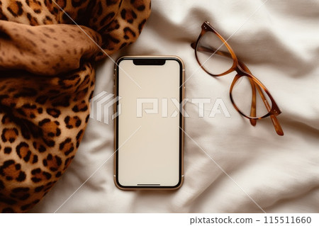 Top view of an cell phone and glasses. 115511660