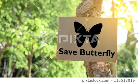 Illustrated with a black butterfly print and the paper sign prominently displays the words save butterfly. Illustrated with a black butterfly print and the paper sign prominently displays the words save butterfly. 115512019