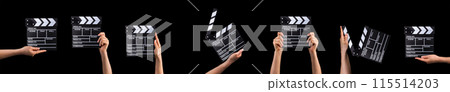 Human hand holding film clapper board isolated on black background. Human hand holding film clapper board isolated on black background. 115514203
