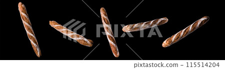 Set of fresh baked bread and French rye baguette isolated on black background 115514204