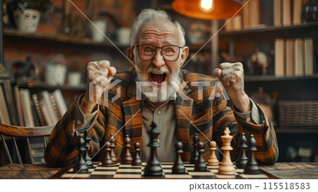 Elderly man celebrating a chess victory with enthusiasm in a cozy room filled with books and warm lighting. Elderly man celebrating a chess victory with enthusiasm in a cozy room filled with books and warm lighting. 115518583